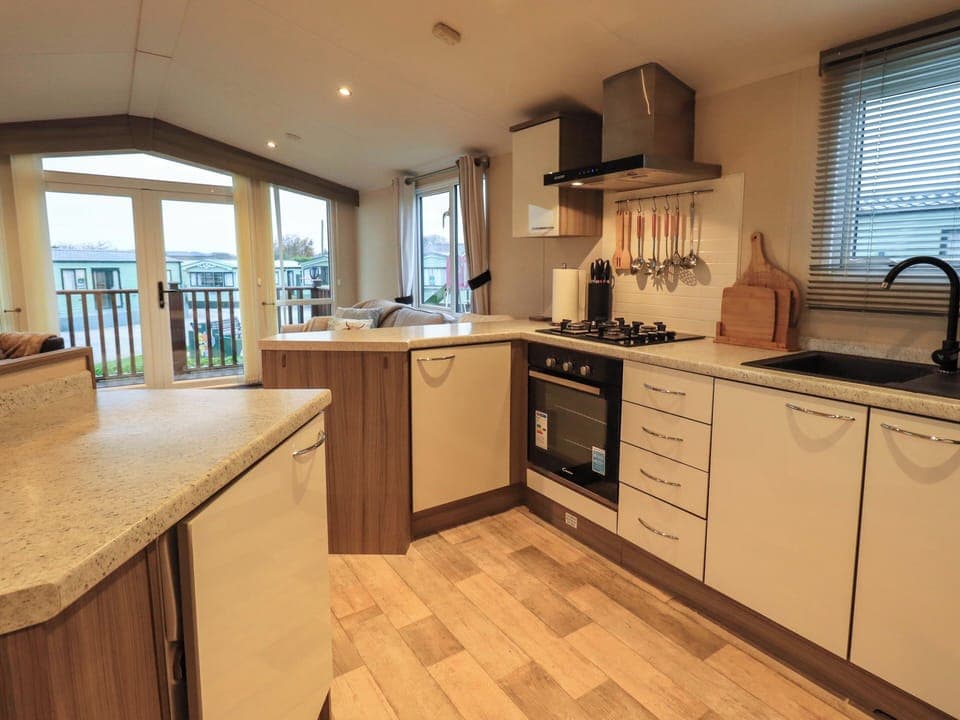 Fridge, electric kettle, toaster, cookware/dishes/utensils