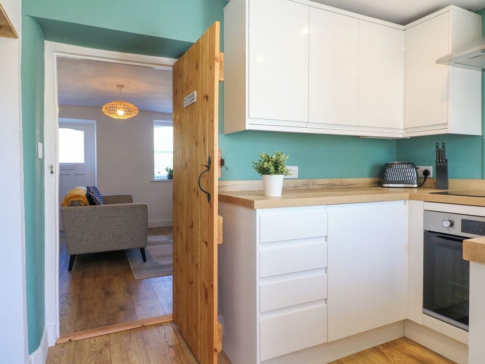 Fridge, electric kettle, toaster, cookware/dishes/utensils