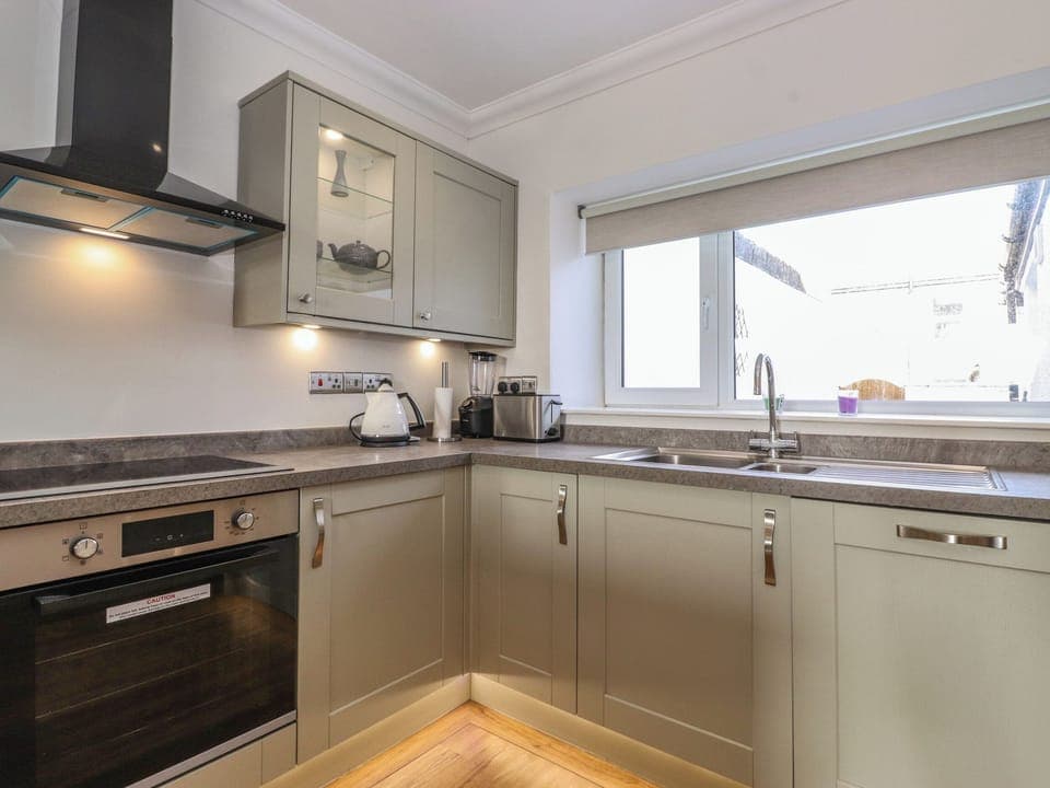 Fridge, dishwasher, electric kettle, cookware/dishes/utensils