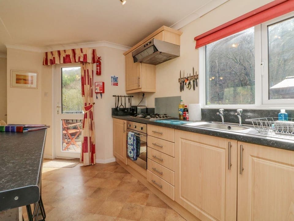 Fridge, electric kettle, cookware/dishes/utensils