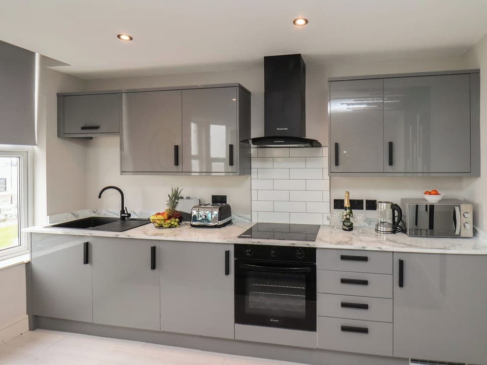 Fridge, electric kettle, toaster, cookware/dishes/utensils