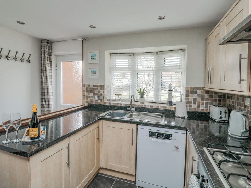 Fridge, dishwasher, electric kettle, toaster