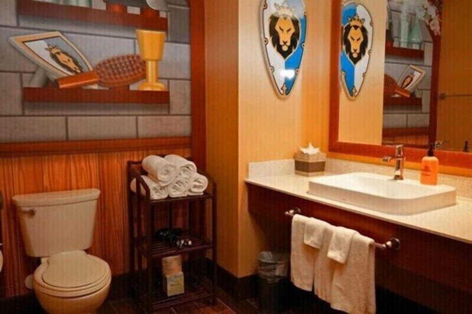 Knights & Dragons Deluxe Room at Castle Hotel | Desk, laptop workspace, blackout drapes, iron/ironing board