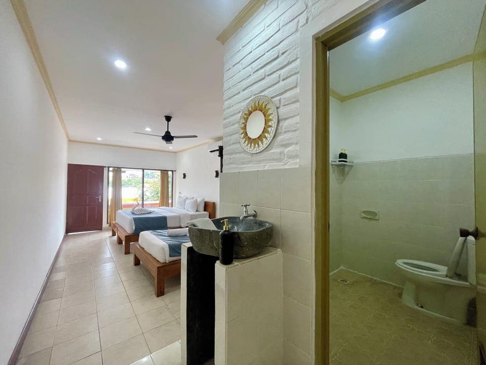 Deluxe Triple Room, Balcony | Free WiFi