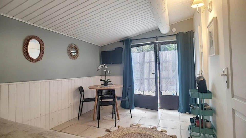 Classic Double Room, Patio | Living area | TV