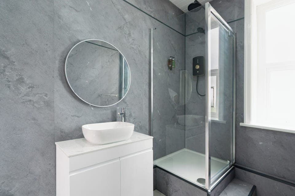 Shower, slippers, towels, soap