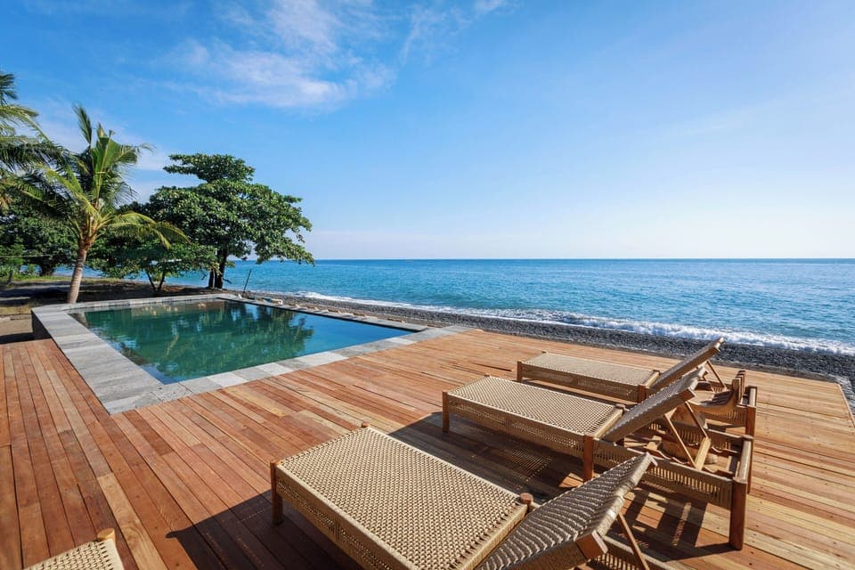 Outdoor pool, pool umbrellas, sun loungers