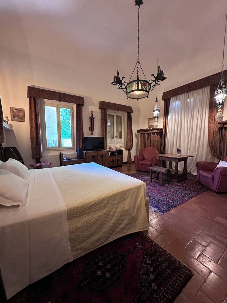 Superior Triple Room, Courtyard View | Minibar, in-room safe, desk, laptop workspace