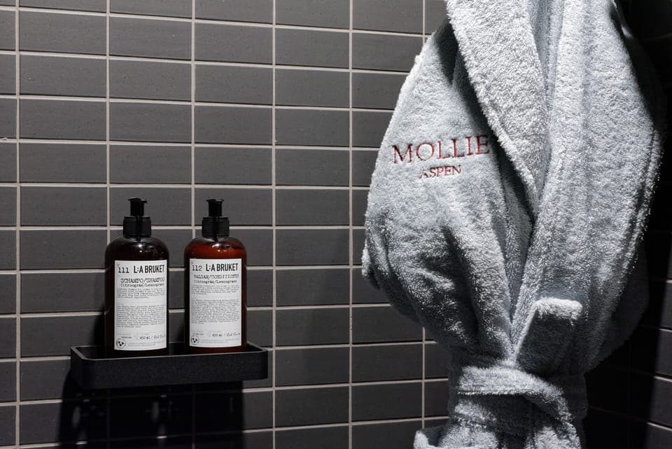 Bathrobes, slippers, towels, soap