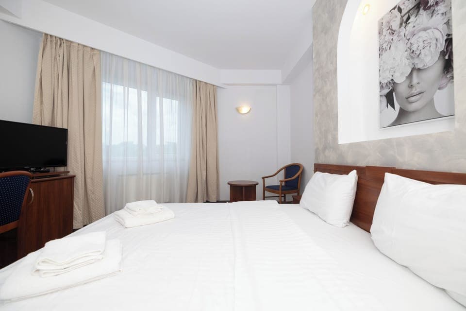 Minibar, desk, laptop workspace, blackout drapes