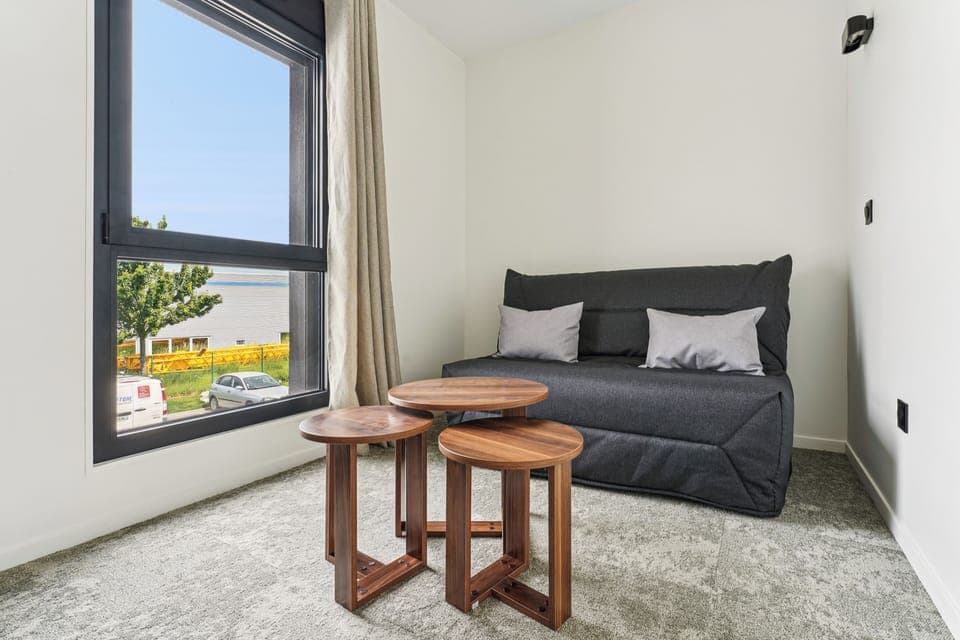 Superior Quadruple Room | Living area | TV