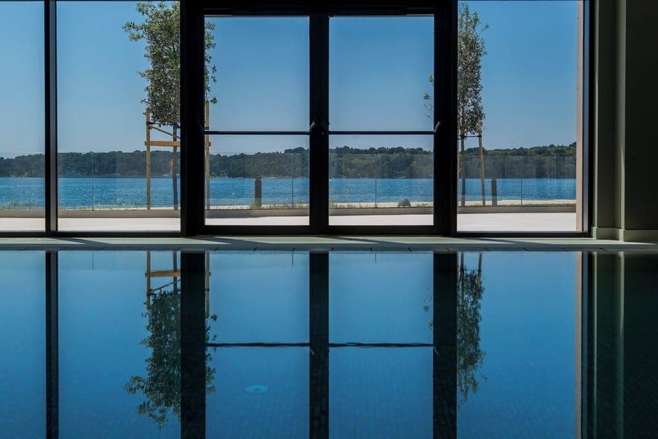 Indoor pool, open 9:00 AM to 9:00 PM, sun loungers