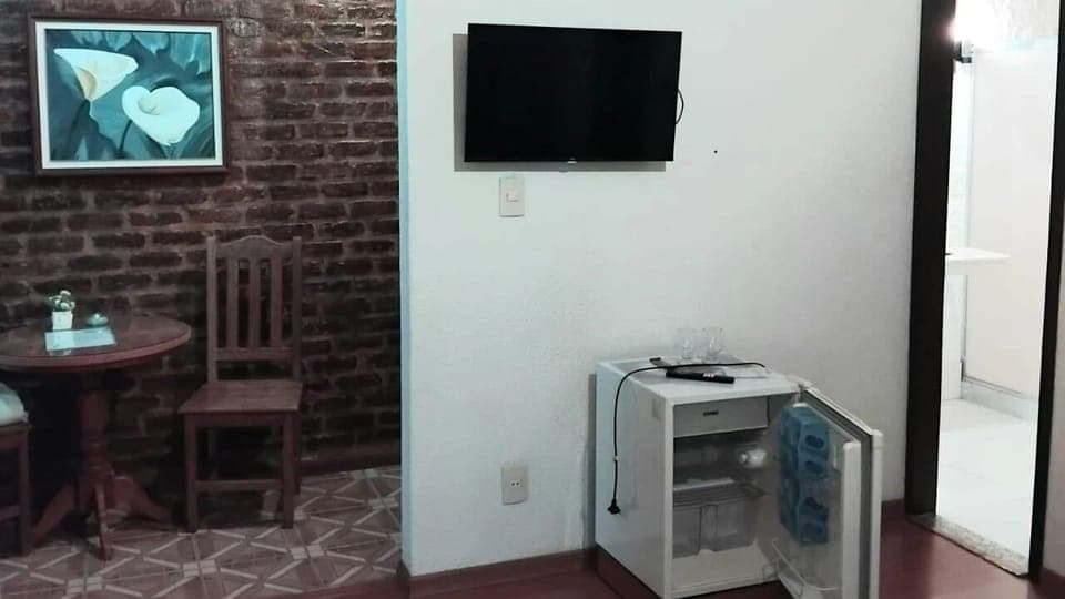 Deluxe Triple Room | Minibar, individually decorated, individually furnished, blackout drapes