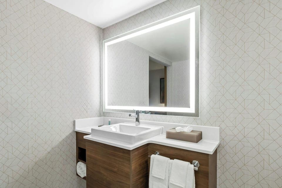 Suite, Multiple Beds | Bathroom | Shower, hair dryer, towels, soap