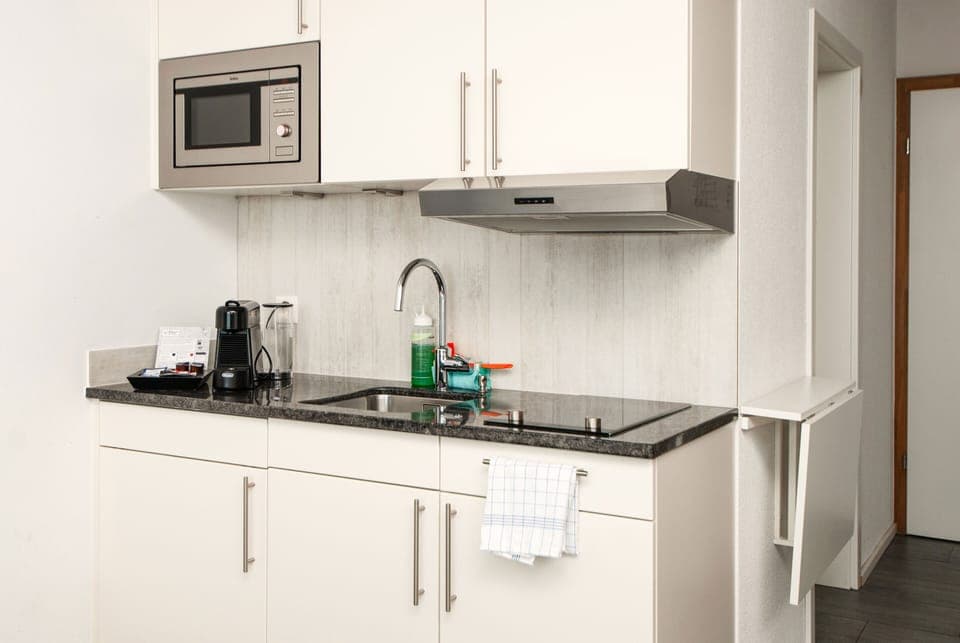 Apartment, Kitchenette | Private kitchen | Eco-friendly cleaning products