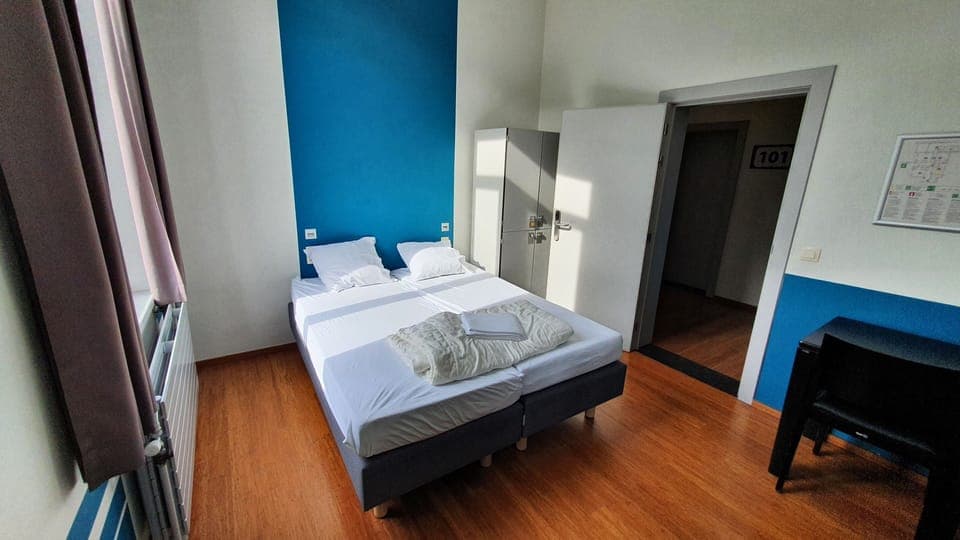 Twin Room, Shared Bathroom | In-room safe, soundproofing, free WiFi, bed sheets