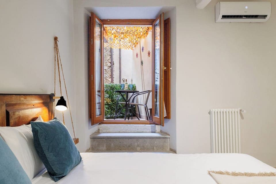 Luxury Condo, Courtyard View | Desk, laptop workspace, free WiFi