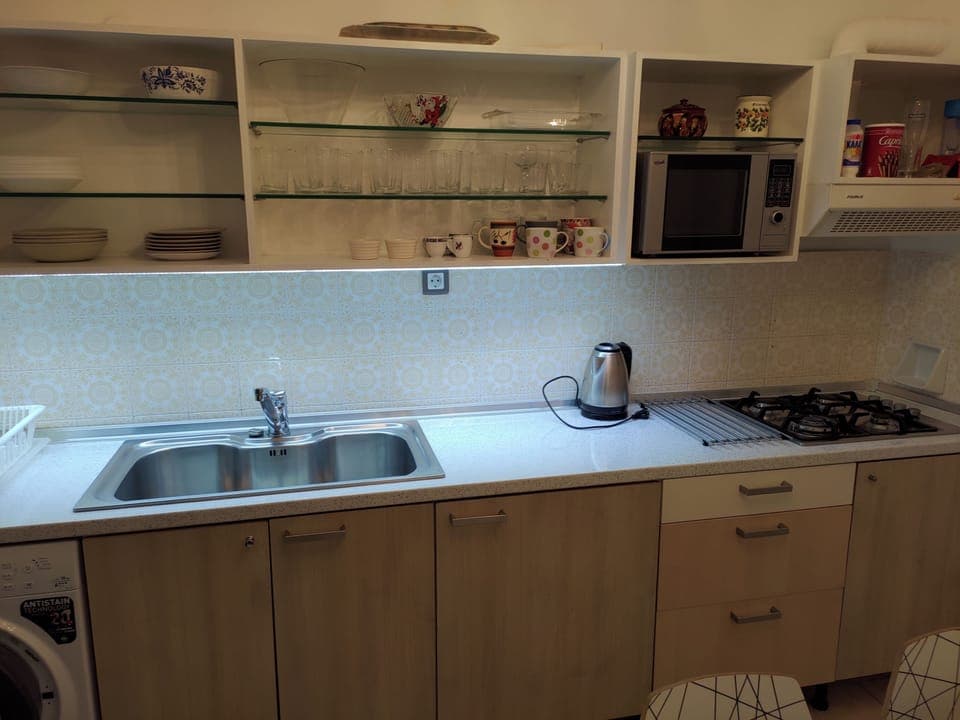 Fridge, microwave, stovetop, electric kettle