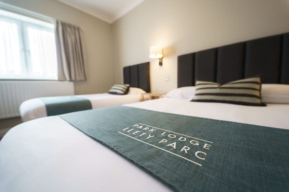 Family Triple Room, Multiple Beds | Desk, laptop workspace, iron/ironing board, free WiFi