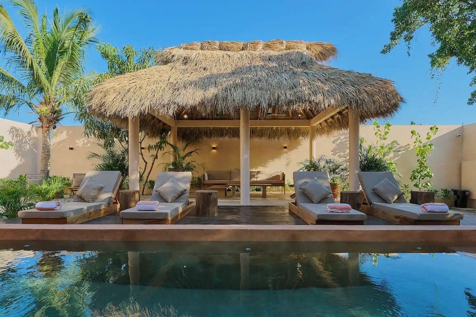 Suite, Balcony, Pool View | Living area | 60-inch Smart TV with digital channels, Netflix, streaming services