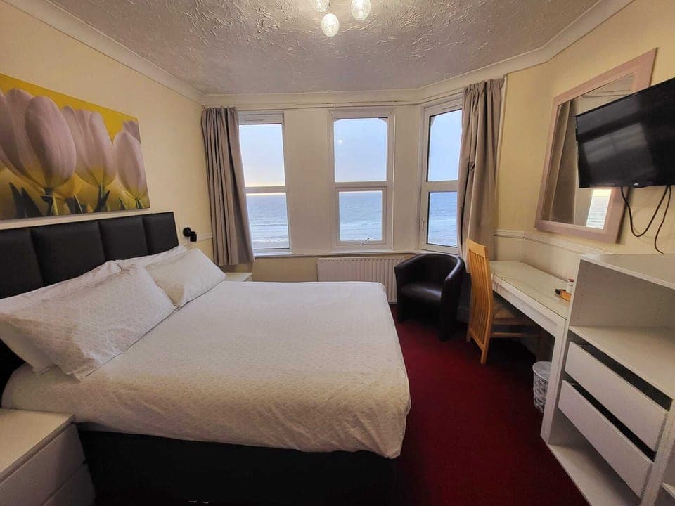 Family Room, Sea View | Iron/ironing board, free WiFi, bed sheets