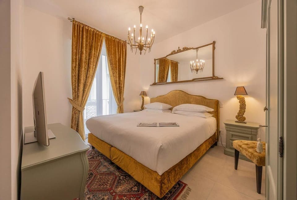 Premium Suite, Balcony, City View | In-room safe, desk, laptop workspace, blackout drapes