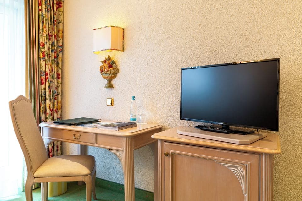 Comfort Single Room, Balcony, Garden View | In-room safe, desk, laptop workspace, iron/ironing board