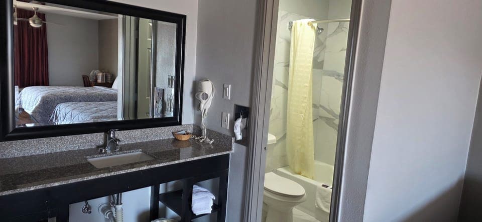 Hair dryer, towels, soap, shampoo