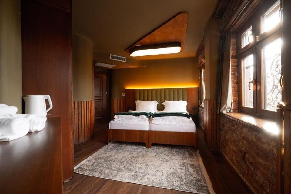 Quadruple Room, City View | Desk, laptop workspace, free WiFi