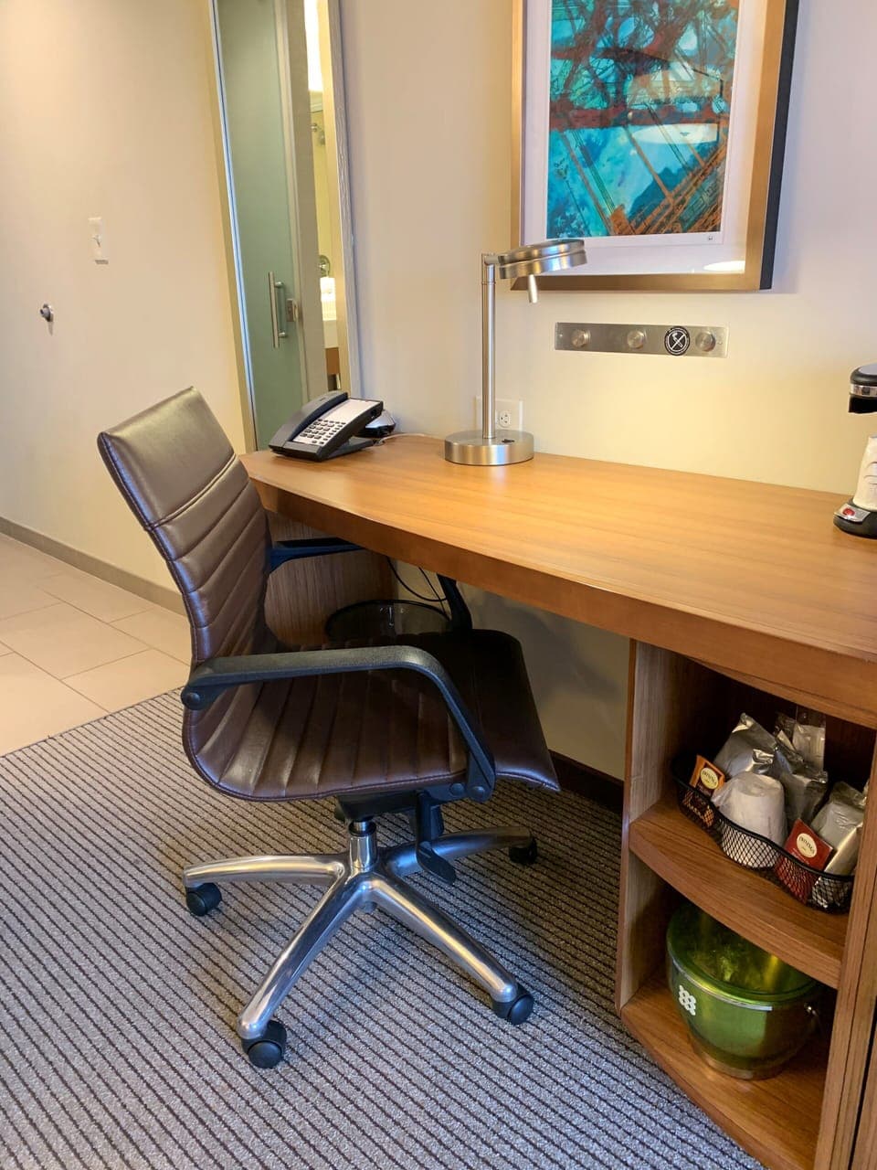 Desk, laptop workspace, blackout drapes, iron/ironing board