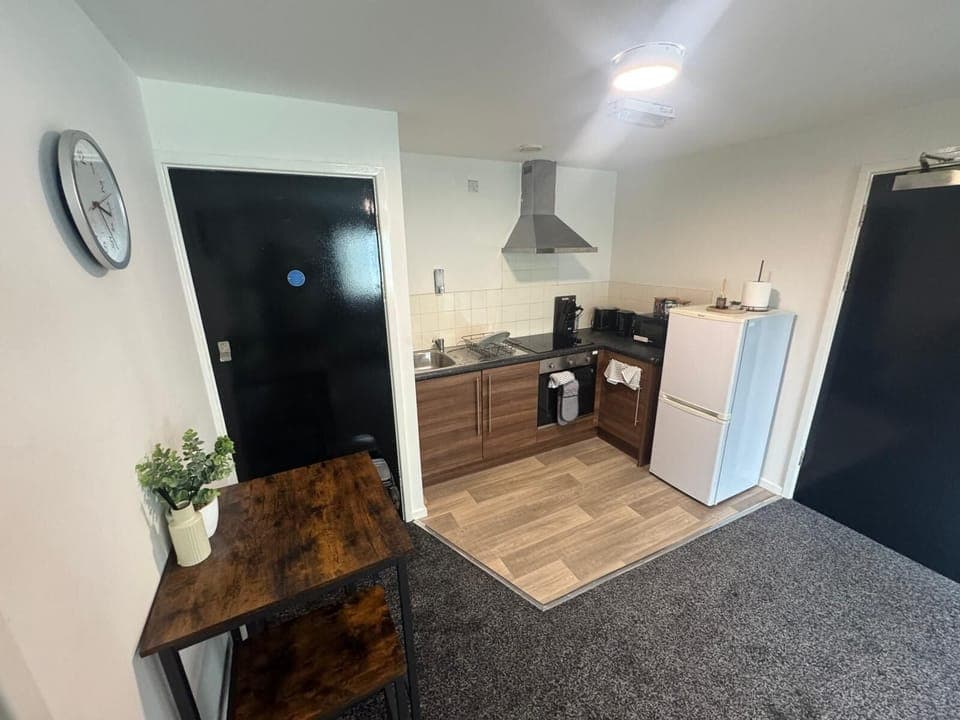 Economy Apartment, 1 Double Bed with Sofa bed | Living area | 32-inch TV with digital channels