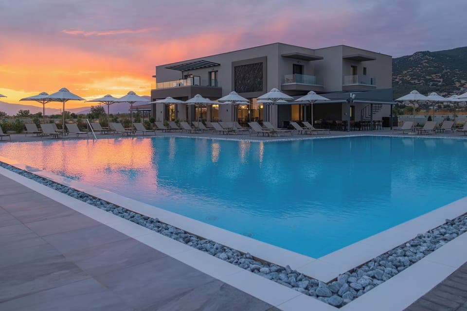 Indoor pool, seasonal outdoor pool, pool umbrellas, sun loungers