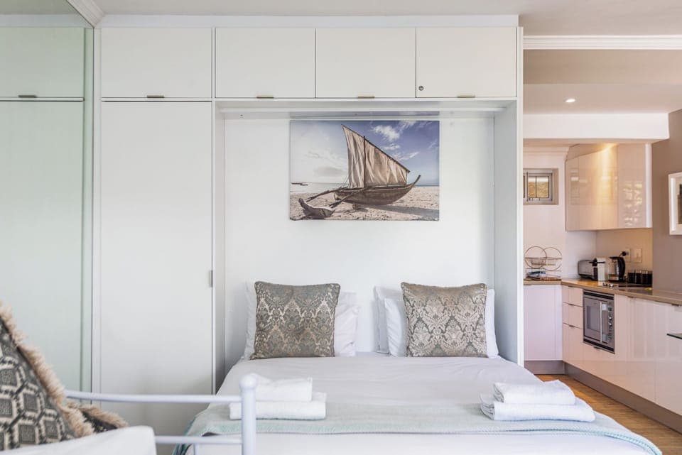 Deluxe Apartment, Balcony, Beach View | Iron/ironing board, free WiFi