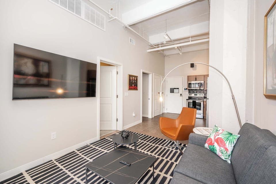 Apartment, Multiple Beds, Kitchen, City View (The 333 Suites 302) | Living area