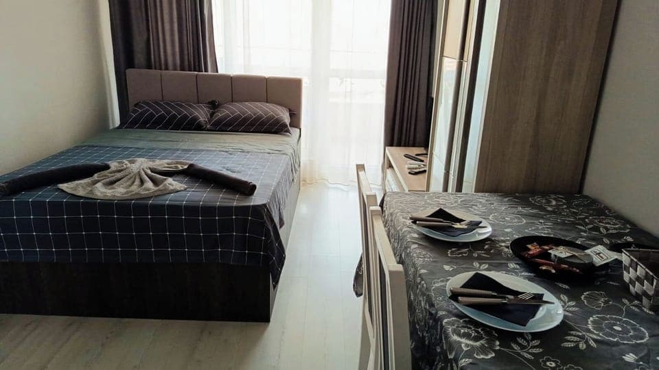 Blackout drapes, iron/ironing board, free WiFi, bed sheets