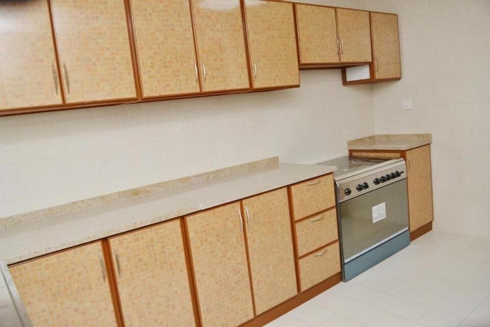 Full-size fridge, microwave, cookware/dishes/utensils