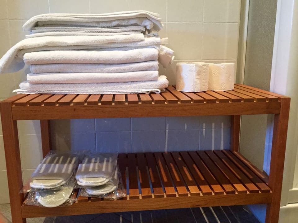 Shower, free toiletries, slippers, towels