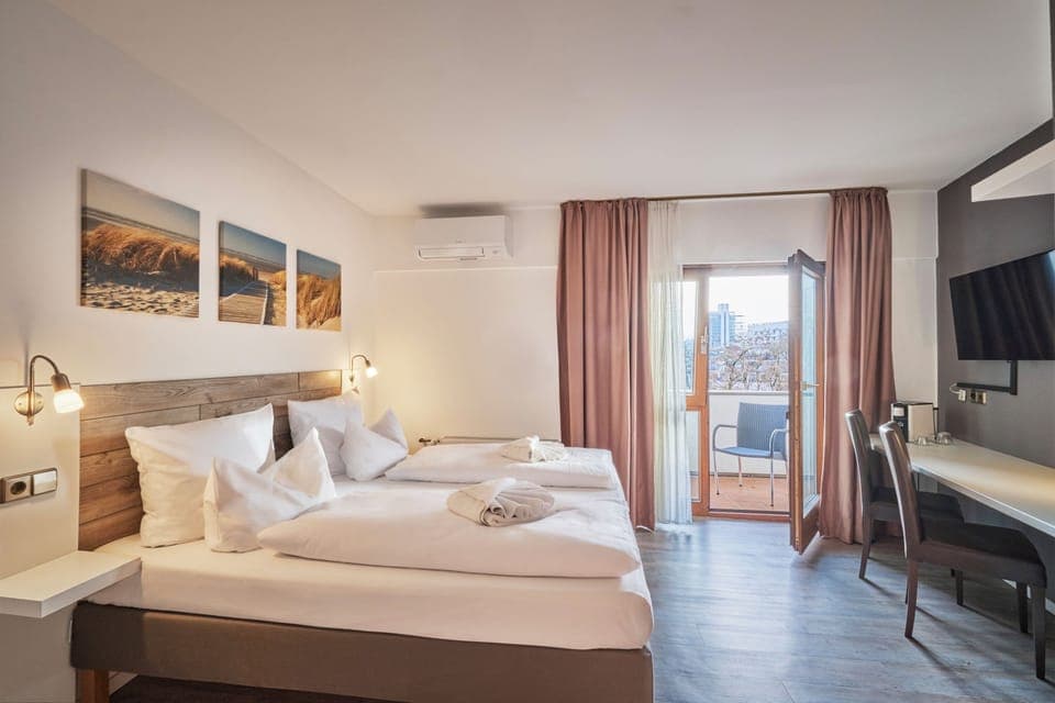 Hypo-allergenic bedding, in-room safe, desk, laptop workspace