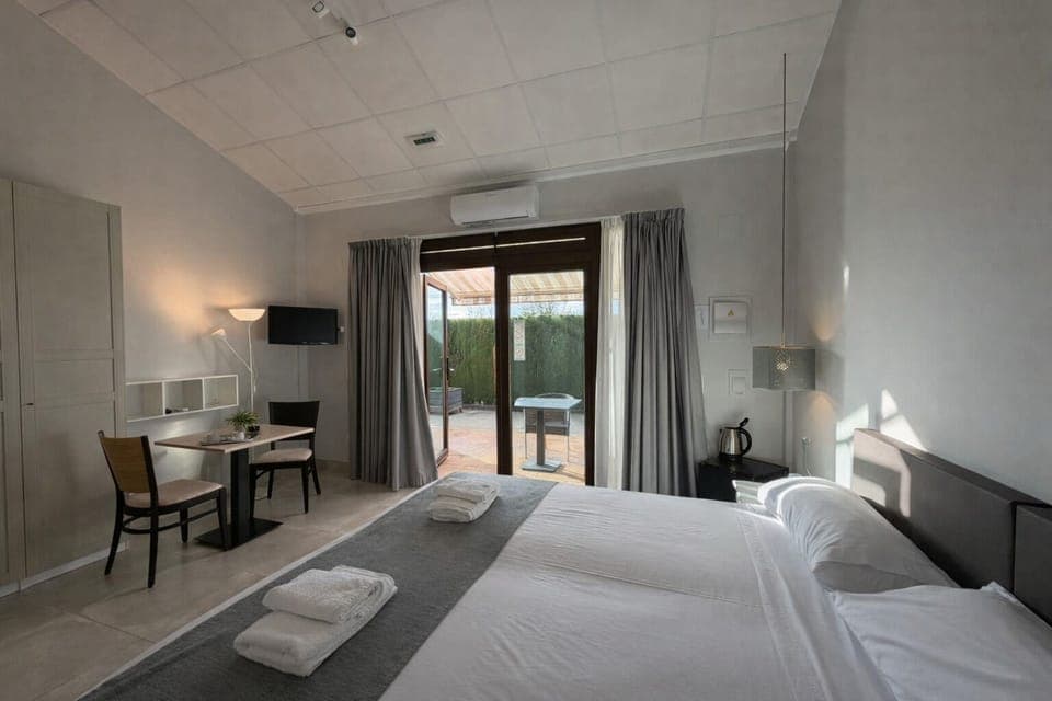 Classic Double or Twin Room, Balcony, Garden View | Minibar, in-room safe, individually decorated, individually furnished