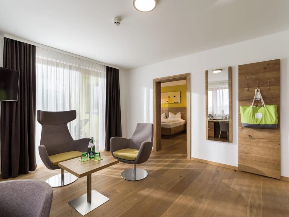 Suite, Balcony, Mountain View | Minibar, in-room safe, desk, blackout drapes