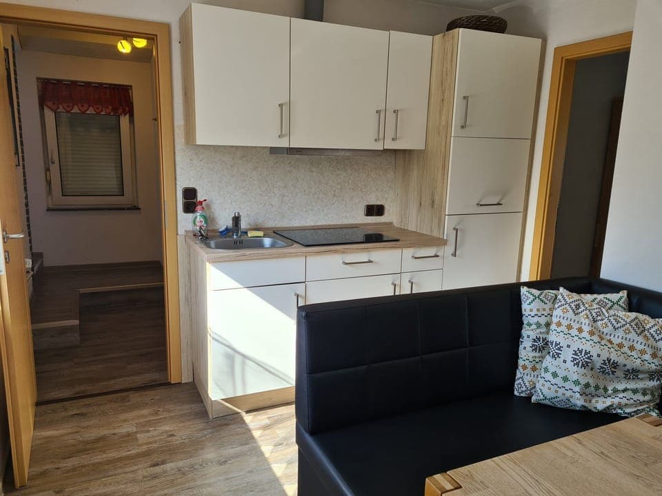 Family Apartment | Living area | 43-inch flat-screen TV with cable channels