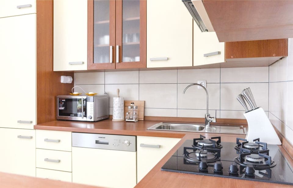 Villa | Private kitchen | Fridge, microwave, oven, stovetop