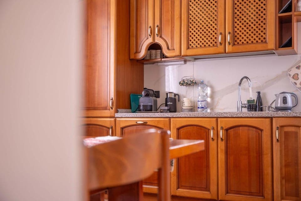 Deluxe Apartment, Balcony, Mountain View | Private kitchen | Espresso maker, coffee/tea maker, electric kettle, highchair