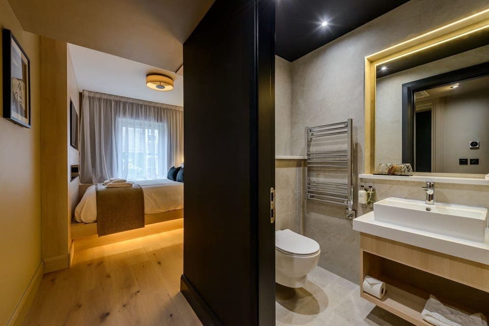 Deluxe Double Room | In-room safe, blackout drapes, iron/ironing board, free WiFi