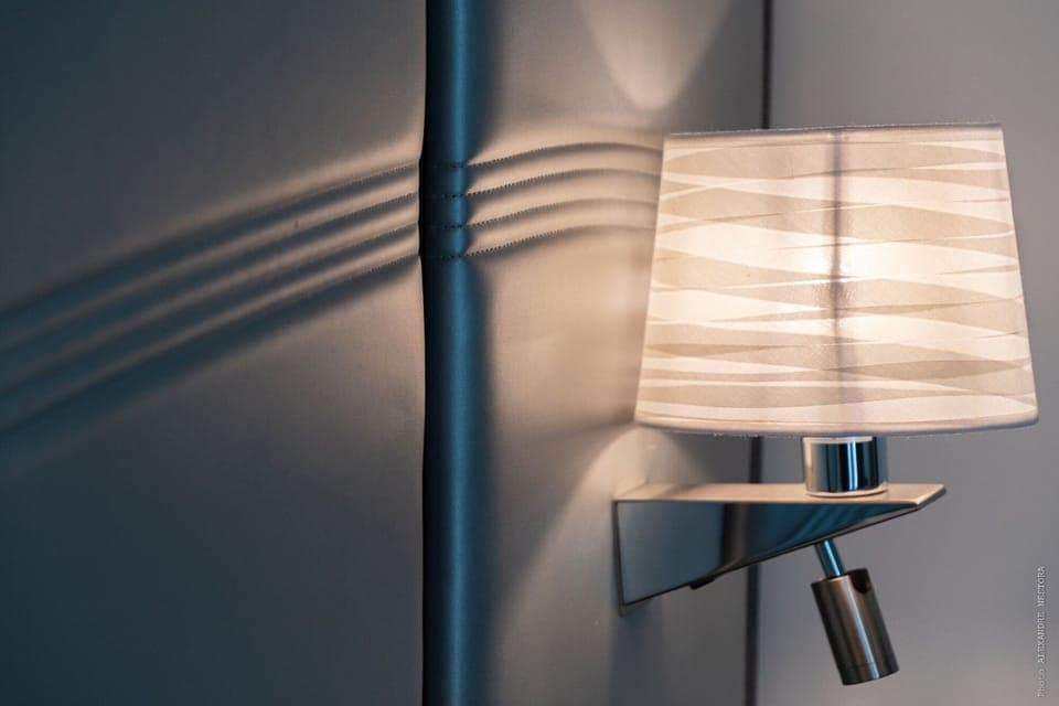 Premium bedding, desk, laptop workspace, soundproofing