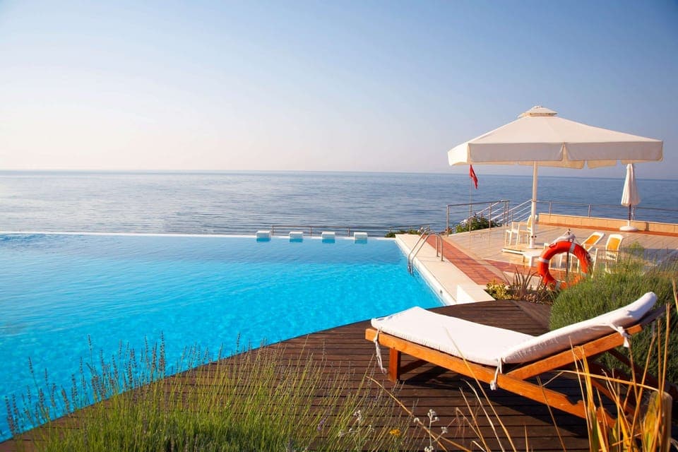 Seasonal outdoor pool, pool umbrellas, sun loungers