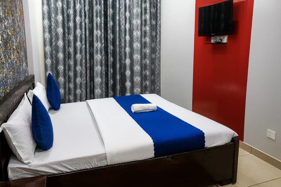 Deluxe Double Room, Garden View | Desk, free WiFi