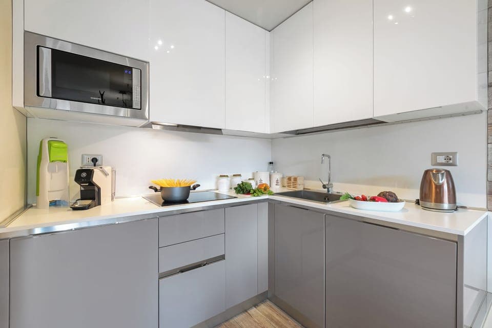 Standard Apartment, Multiple Bedrooms (Appartamento La Picozza) | Private kitchen | Fridge, microwave, stovetop, dishwasher