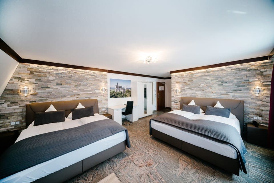 Superior Quadruple Room | In-room safe, blackout drapes, soundproofing, iron/ironing board