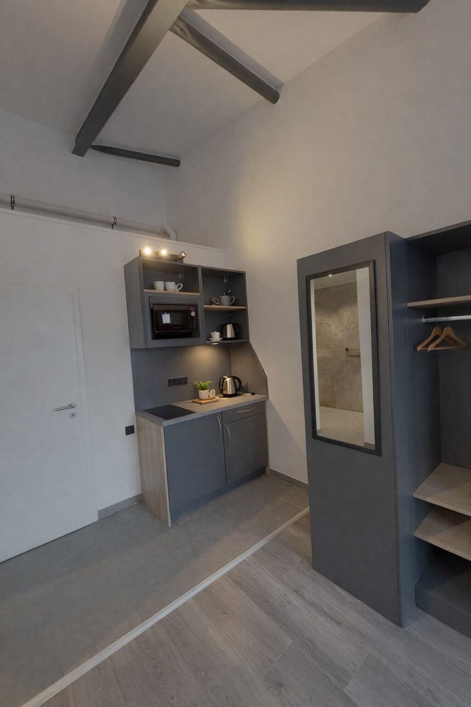 Deluxe Double Room, Kitchenette | Desk, laptop workspace, blackout drapes, soundproofing